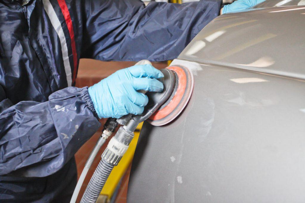 Sanding an Auto Body with an Air Orbital Sander