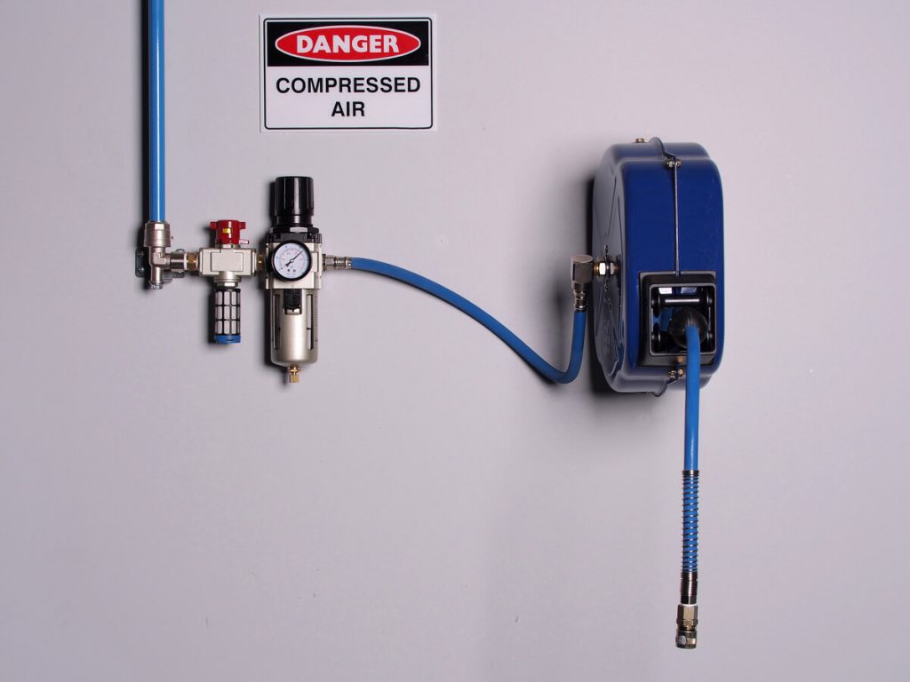 Blue wall-mounted air hose reel